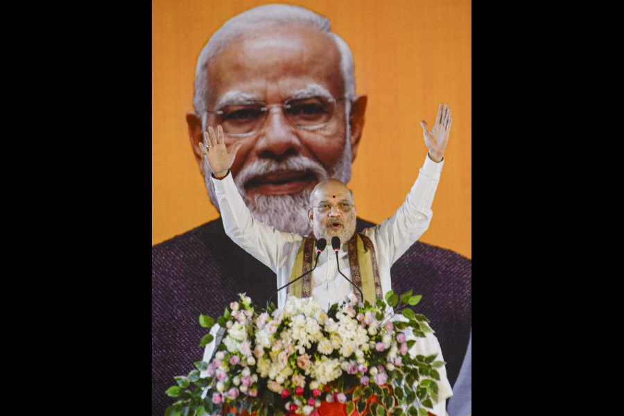 Amit Shah addresses the BJP workers’ meeting in Barrackpore on Saturday.