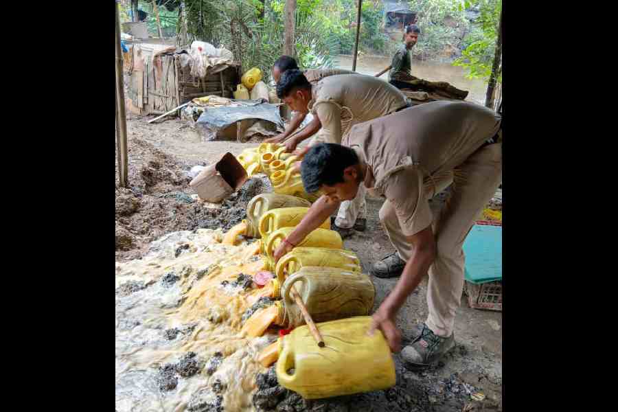 Excise officials detroy illicit liquor in Ghatal, West Midnapore. File picture