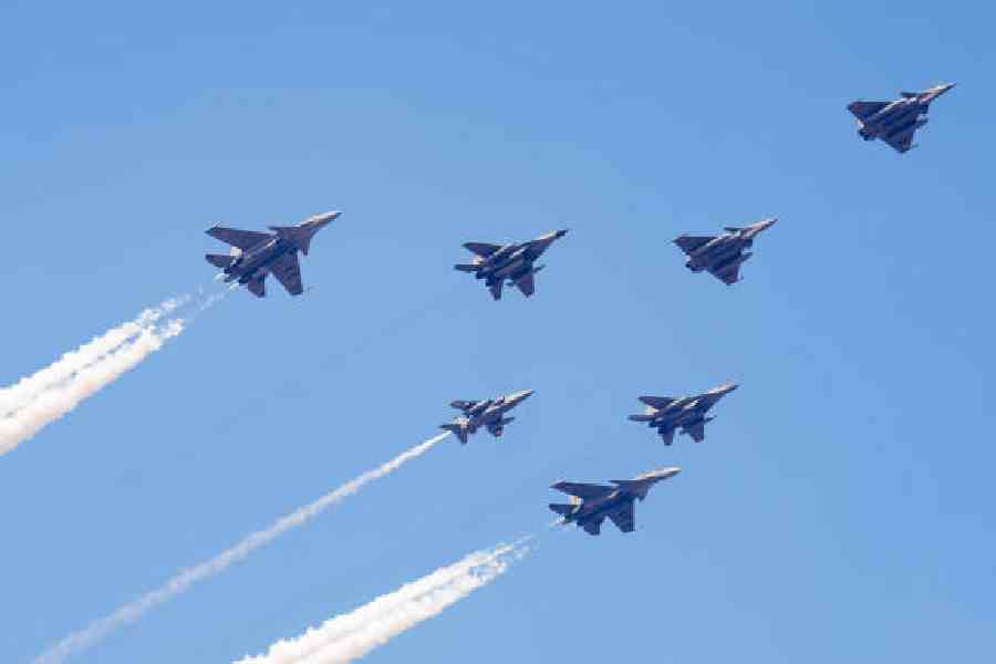 The Indian Air Force’s MiG-29, Rafale, Sukhoi Su-30MKI and Jaguar aircraft perform a flypast during the 77th Republic Day parade in New Delhi. (PTI)