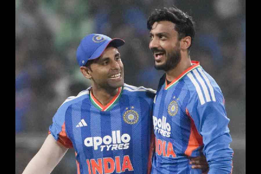Axar Patel (right), with captain Suryakumar Yadav, on Saturday.