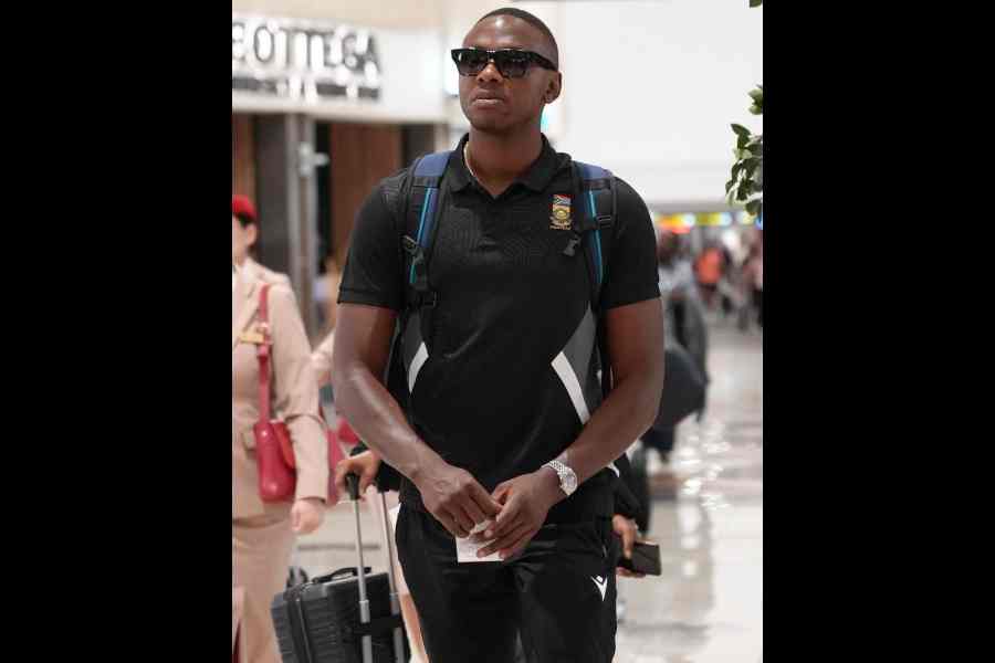 Touchdown: Pacer Kagiso Rabada arrives with the South Africa team, in Mumbai on Monday. The Proteas play a warm-up game with India in Navi Mumbai on Wednesday before the month-long T20 World Cup gets underway on the weekend.
