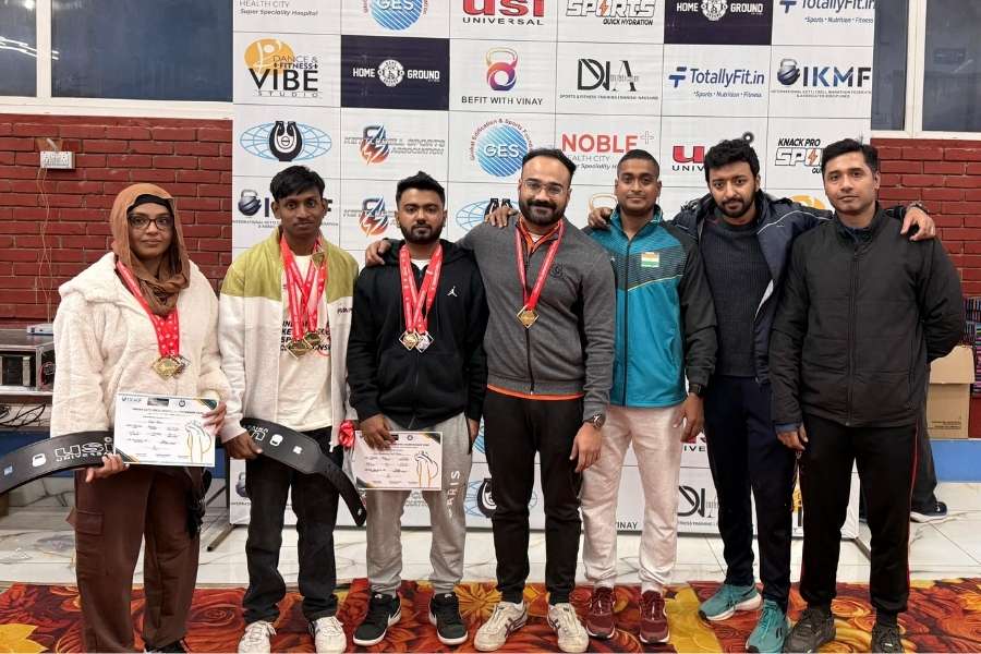 Kettlebell lifters from Bengal pose with their medal haul in Rohtak