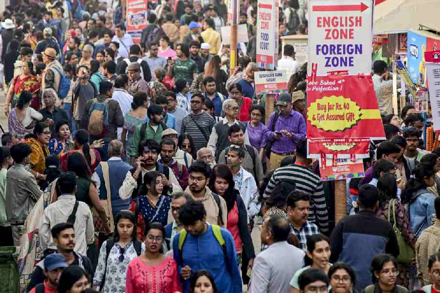People throng stalls on the closing day of the 49th International Kolkata Book Fair, in Kolkata