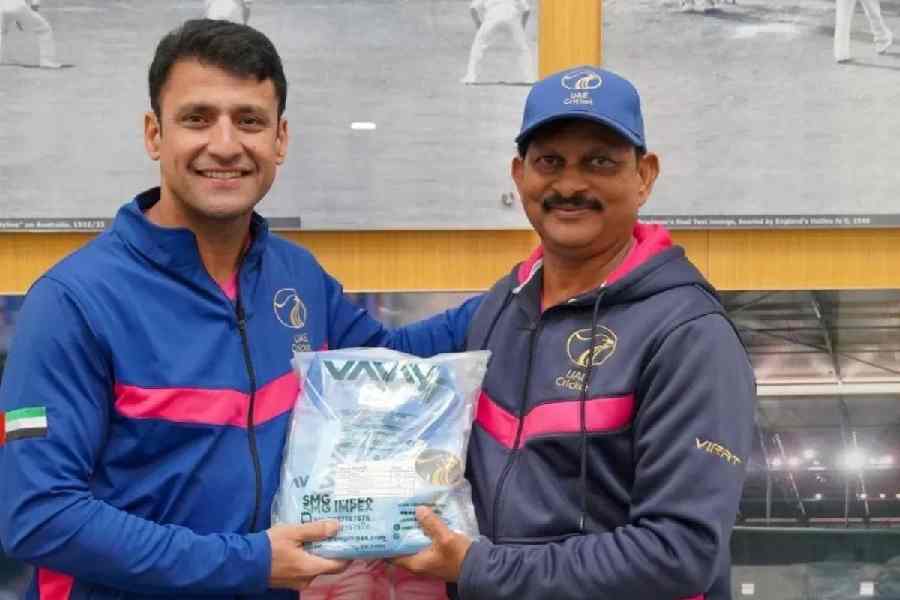 UAE head coach Lalchand Rajput (right) withfast bowling coach Yasir Arafat in Dubai, in a picture shared on Facebook, before the team’s departure for the T20 World Cup 
