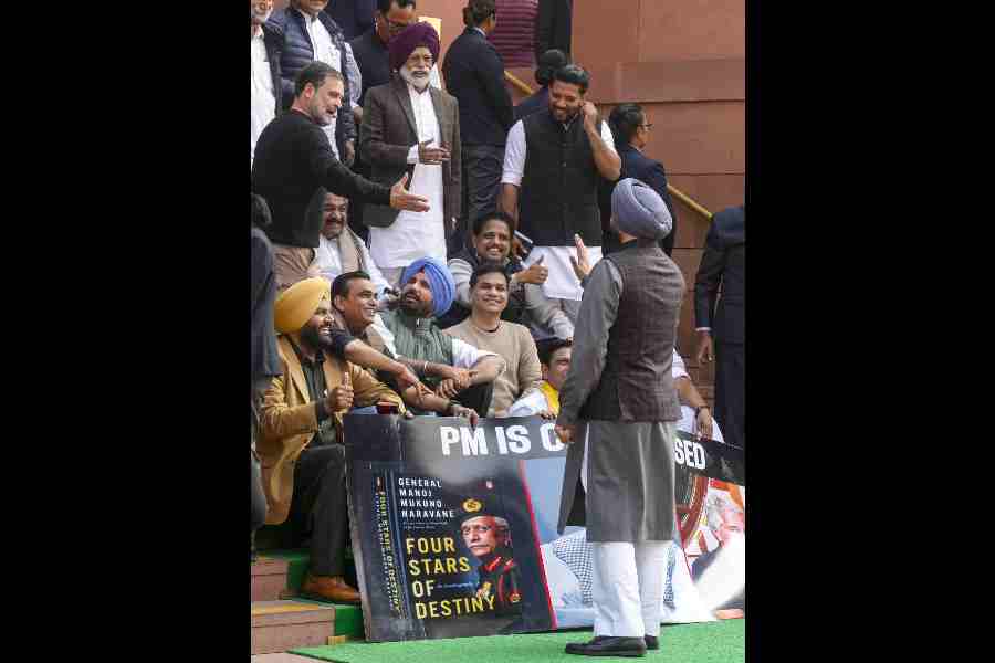 Union Minister of State Ravneet Singh Bittu, right, in a conversation with Leader of Opposition in the Lok Sabha Rahul Gandhi during the Budget Session of Parliament, in New Delhi, Wednesday, Feb. 4, 2026.