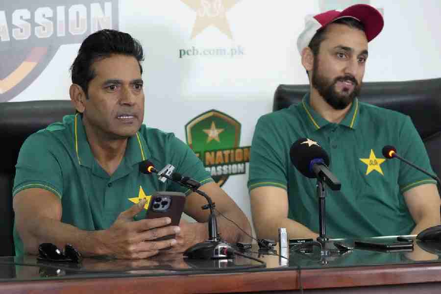 Aaqib Javed (L) and Salman Ali Agha (R)