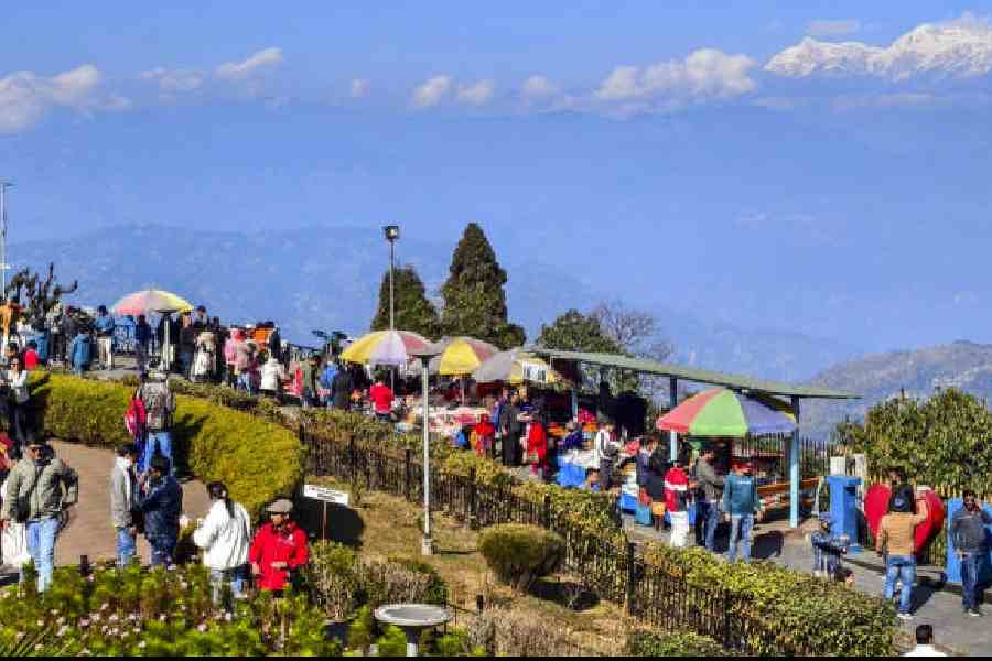 Tourists visit the Batasia Loop in Darjeeling on December 31