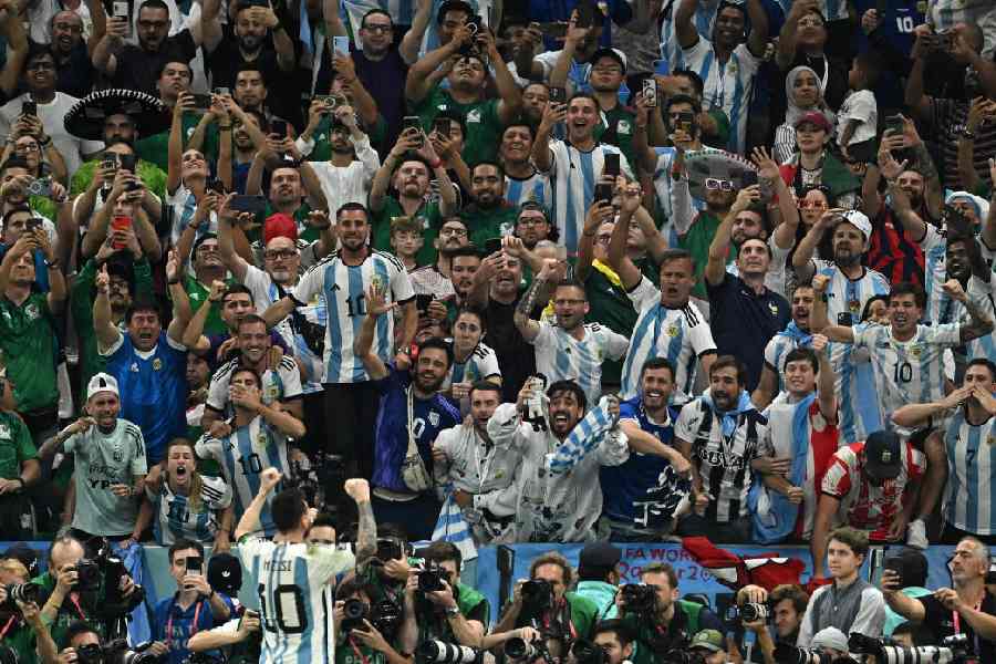 Lionel Messi works the crowd at the Lusail Stadium in Qatar after scoring against Mexico in a Fifa World Cup match on November 26, 2022.