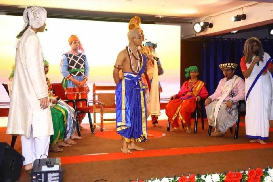Students stage a play and (right) dance at IEM Public School Salt Lake