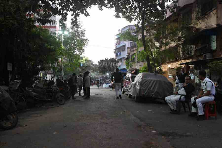 Policemen on Kankulia Road on Monday after Sunday night’s violence