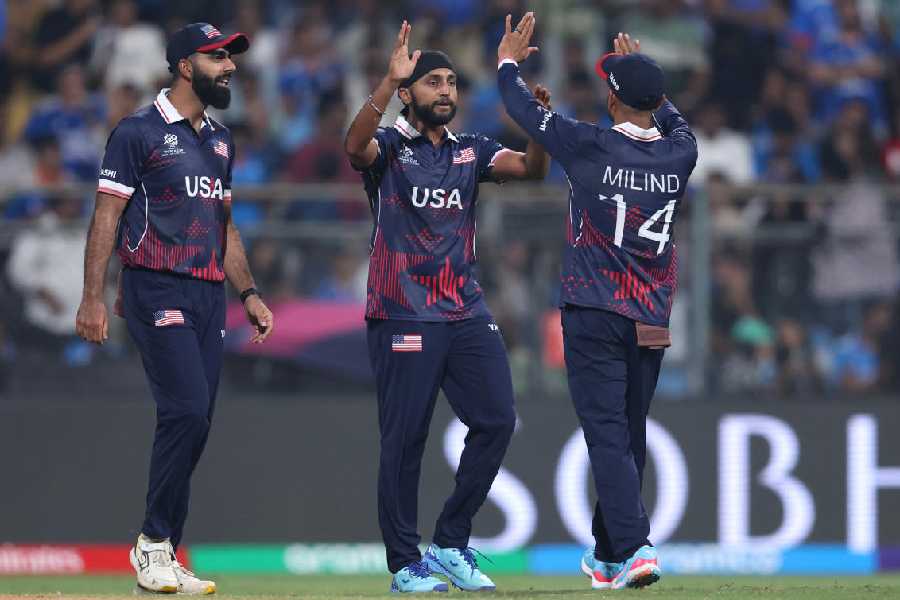 Harmeet Singh (left) after dismissing Hardik Pandya on Saturday.