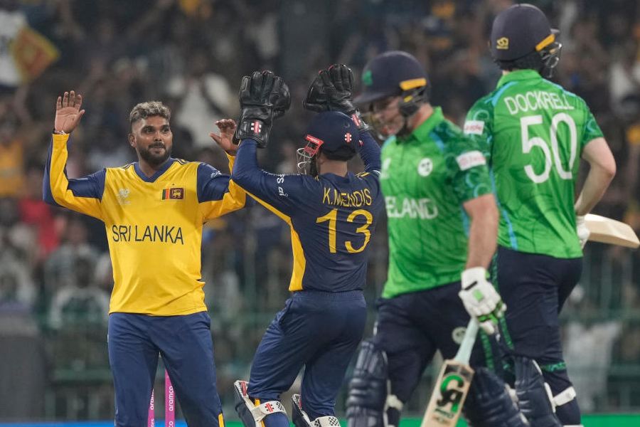 Sri Lanka's Wanindu Hasaranga, left, celebrates the wicket of Ireland's Curtis Campher during the T20 World Cup cricket match between Sri Lanka and Ireland in Colombo, Sri Lanka, Sunday, Feb. 8, 2026.