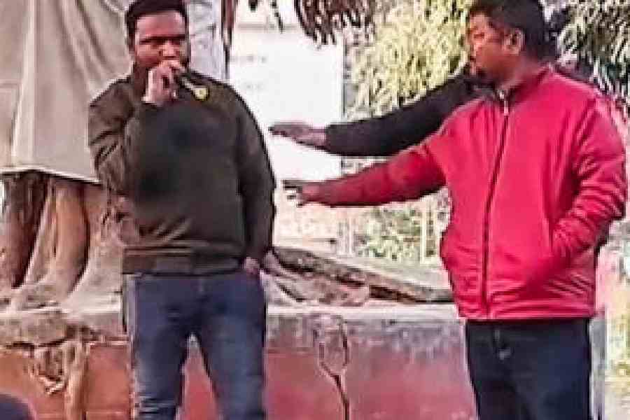 A screenshot from a video purportedly showing youths asking for teacher Yasin Mian's mic on Saturday