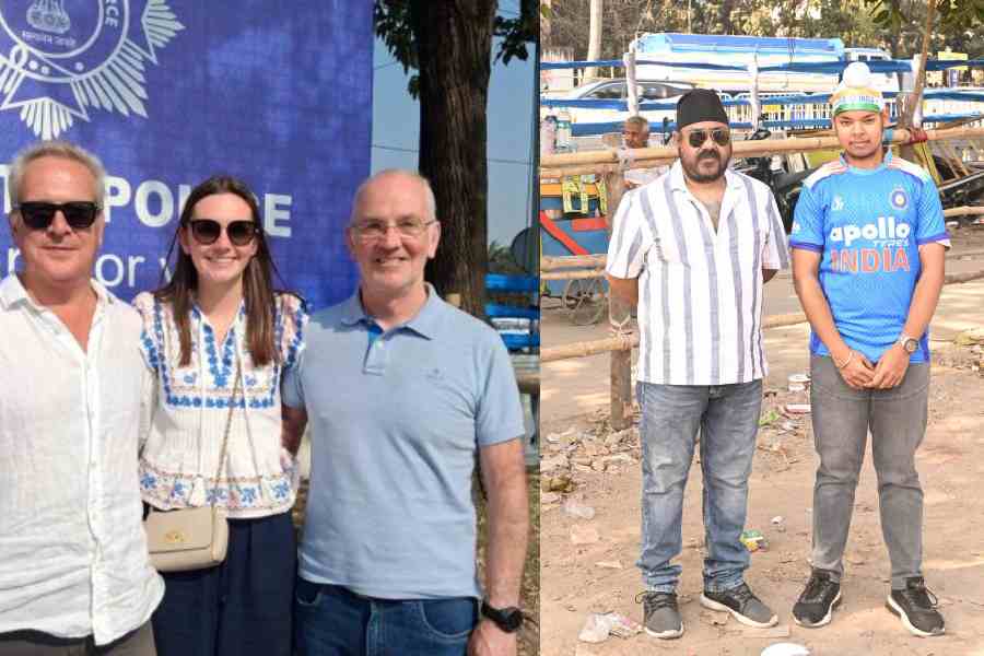 (From right) Roddy Anderson, his daughter Niamh, and friend Harry outside Eden Gardens on Monday. (RIGHT) Ramandeep Singh with his father
