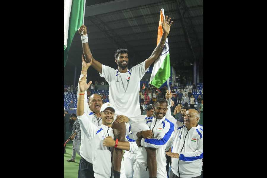 Dhakshineswar Suresh being carried by teammates after India won the Davis Cup Qualifier Round One tie against the Netherlands in Bengaluru on Sunday.