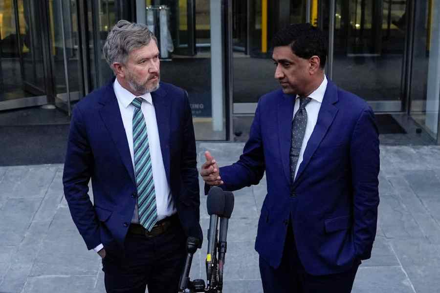 U.S. Representatives Thomas Massie (R‑KY) and Ro Khanna (D‑CA) speak to the media after viewing unredacted Jeffrey Epstein files at the Department of Justice office building in Washington, D.C., U.S., February 9, 2026