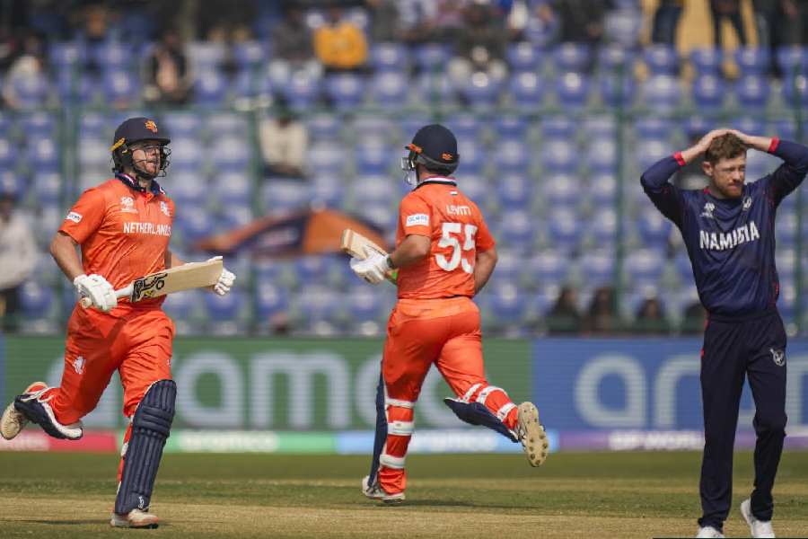 Netherlands Max O'Dowd and Michael Levitt run between the wickets during the ICC Men's T20 World Cup 2026 cricket match between Namibia and Netherlands, at Arun Jaitley Stadium