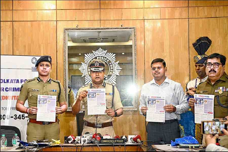 Kolkata Police commissioner Supratim Sarkar (centre) and other senior officers at the launch of the cybercrime helpline at Lalbazar on Tuesday. Picture by Bishwarup Dutta