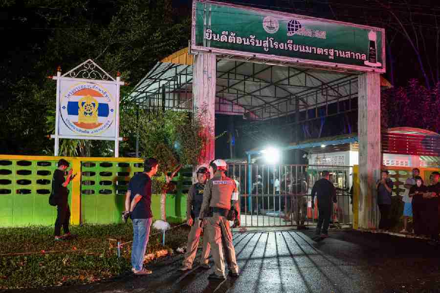 Thailand gunman entered school.
