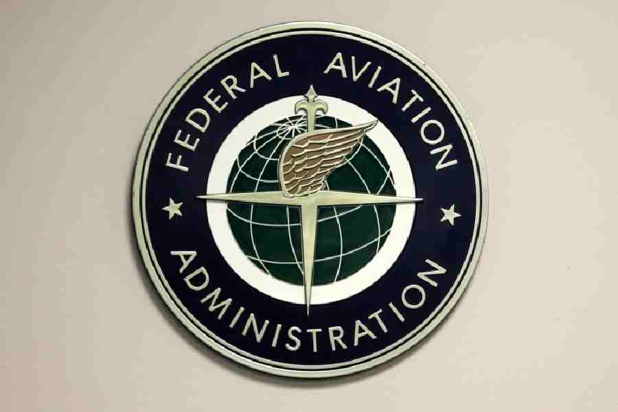A Federal Aviation Administration sign hangs in the tower at John F. Kennedy International Airport in New York, March 16, 2017.