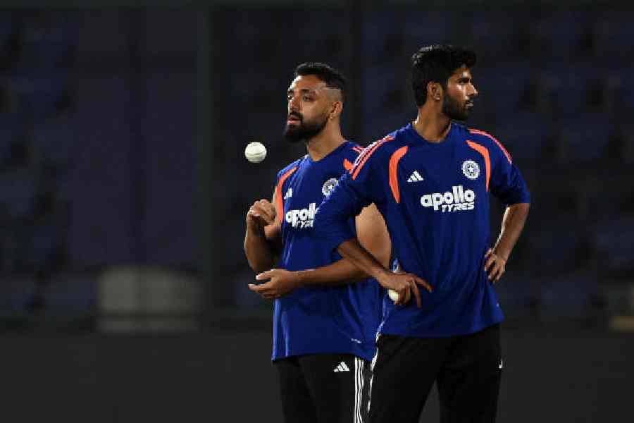 Varun Chakaravarthy and Washington Sundar at India’s training session at the Arun Jaitley Stadium on Wednesday.