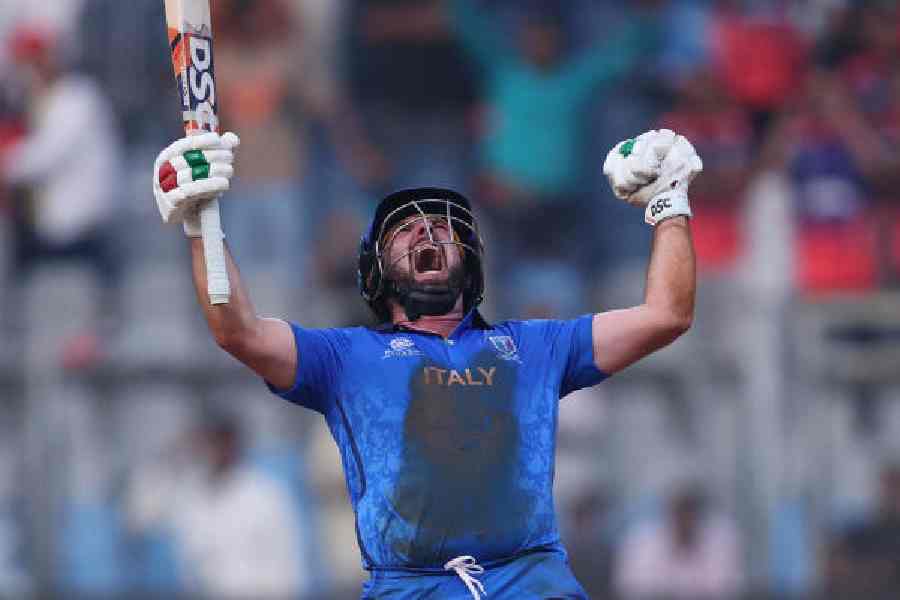 Italy’s Anthony Mosca celebrates after winning their World Cup match against Nepal at the Wankhede and (picture right) Pavan Rathnayake of Sri Lanka during his 28-ball 60 against Oman at the Pallekele Stadium in Kandy, on Thursday.