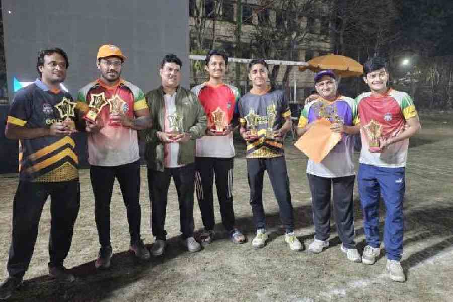 All the individual prize winners pose together with their winnings