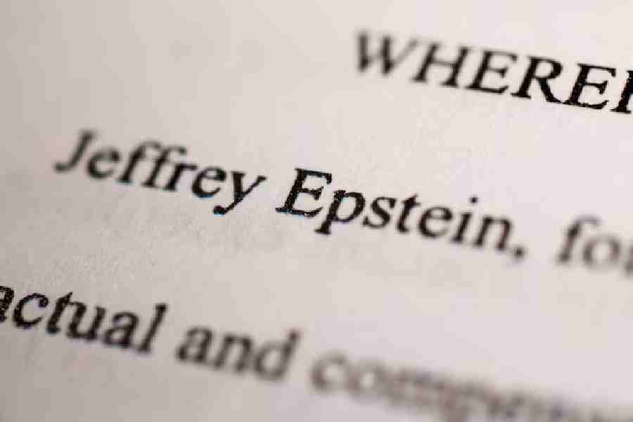 Newly-released documents from disgraced late financier and sex offender Jeffrey Epstein, referencing court cases against him, are seen in this handout released by the US Justice Department and printed and arranged for a photograph by Reuters in Washington, D.C., US, December 19, 2025.