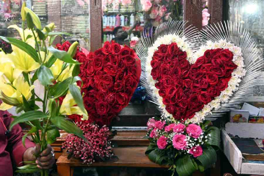 Bouquets being sold in New Market on Friday. Pictures by Sanat Kr Sinha 