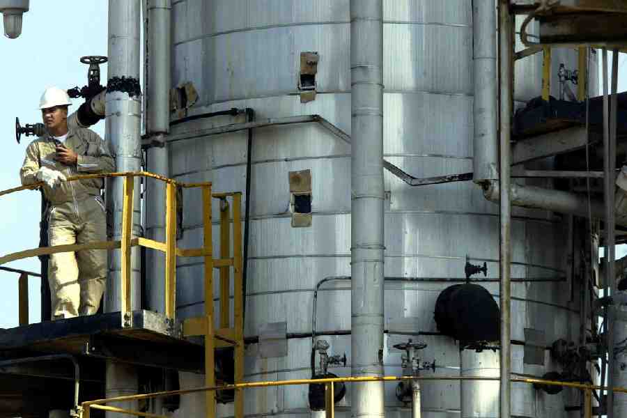 A Venezuelan oil worker of PDVSA at the shipment and storage terminal of Jose, 320km east of Caracus.