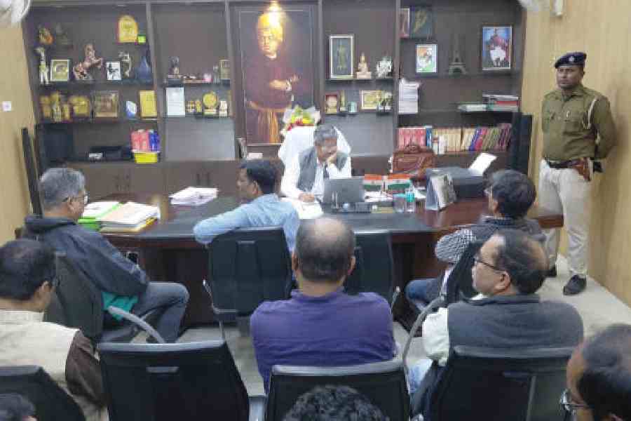 Members of the executive council and some faculty members in the chamber of the vice-chancellor at the Gour Banga University in Malda on Friday. Picture by Soumya De Sarkar