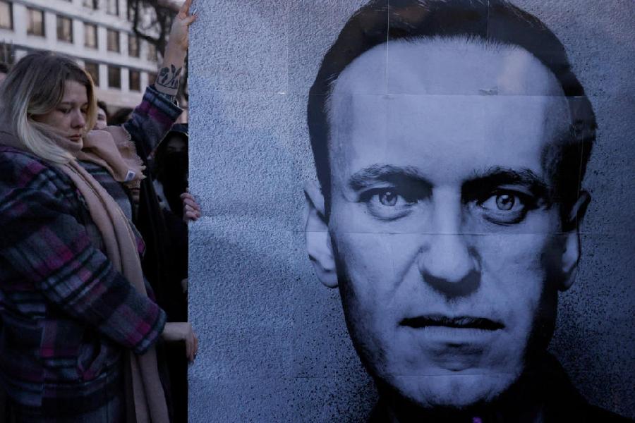People demonstrate following the death of Russian opposition leader Alexei Navalny, in Warsaw