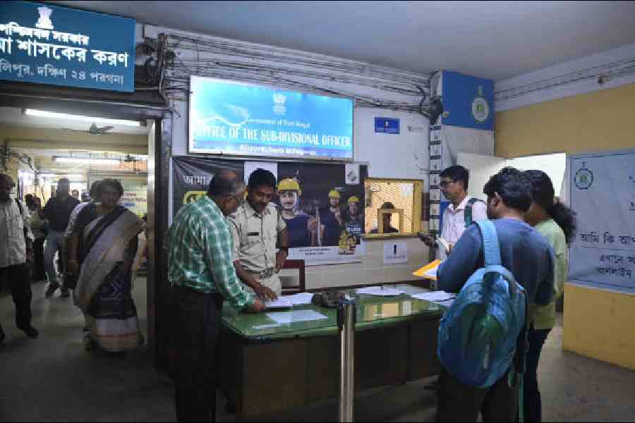 Voters at the SIR hearing centre at the treasury building in Alipore on Saturday