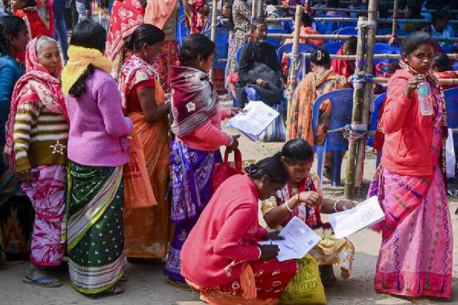 People queue up at a hearing centre in Balurghat on January 20. (PTI picture)