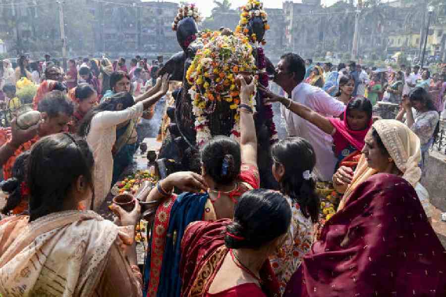 People offer prayers on the occasion of Maha Shivratri in Calcutta on Sunday. (PTI picture)
