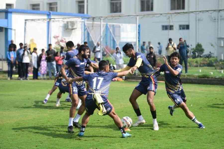 East Bengal players enjoy a team-bonding drill during Sunday's practice session at the Salt Lake Stadium Training Ground. 