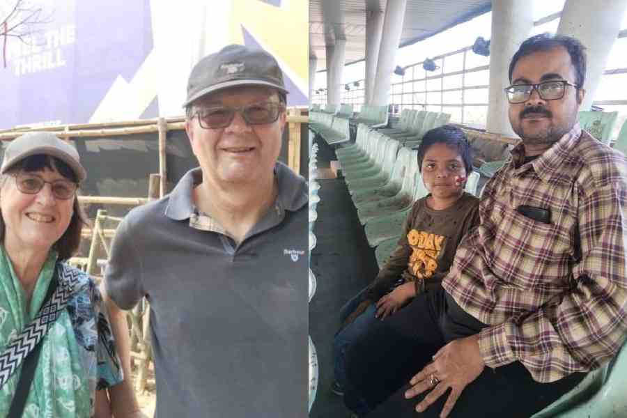 Liz and Collin Wood, Bidyut Mukherjee and son Poumit