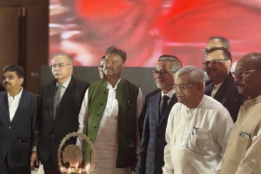State agriculture minister Pradip Mazumdar (in white kurta) and agricultural marketing minister Becharam Manna (in green jacket) at the 61st general meeting of the West Bengal Cold Storage Association in New Town, Calcutta, on Monday.