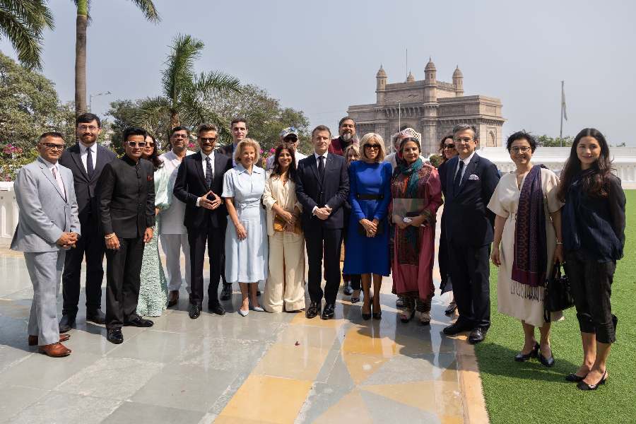 French President Emmanuel Macron and First Lady Brigitte Macron with Indian actors and filmmakers, including Zoya Akhtar, Shabana Azmi, Anil Kapoor and Manoj Bajpayee