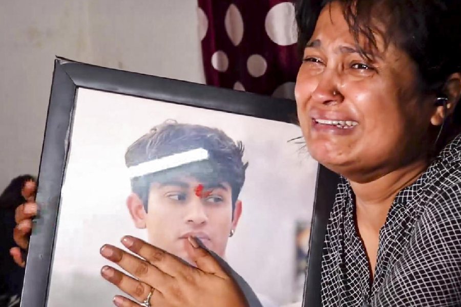 Inna Makan, mother of 23-year-old Sahil Dhaneshra who died after an SUV driven allegedly by a minor collided with his motorcycle, mourns, in New Delhi, Tuesday, Feb. 17, 2026.