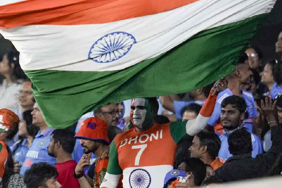 Indian fans cheer during an ICC Men's T20 World Cup 2026 cricket match between India and Netherlands