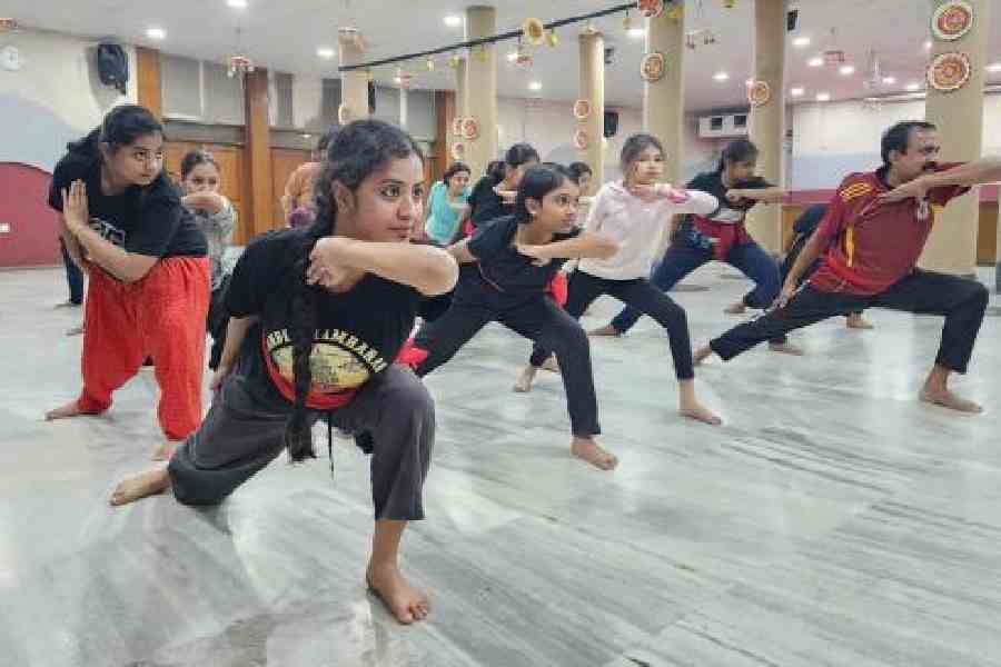 Students learn from kalaripayattu exponent Gurukkal Krishnadas (extreme right) at Bharatiya Vidya Bhavan. (Brinda Sarkar)