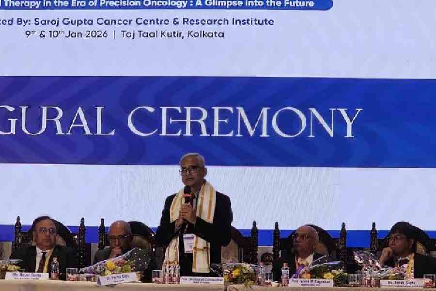Prof. Dhrubajyoti Chattopadhyay, pro-chancellor, Techno India Group University, addresses the gathering as the guest of honour, at the inaugural session of the sixth international conference of the Global Cancer Consortium and the 15th zonal oncology symposium at Taj Taal Kutir, New Town. To his right is the chief guest Partha Basu, head, early detection, prevention and infection branch, International Agency for Research on Cancer, World Health Organisation, France. To his right are Prof. Vivek M. Rangnekar, founding chair of GCC, and Dr Arnab Gupta of the host institute. Picture by Sudeshna Banerjee