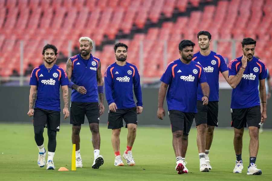 Hardik Pandya, flanked by Ishan Kishan and Rinku Singh, during India’s training session on Friday, ahead of their Super Eight opener in Ahmedabad.