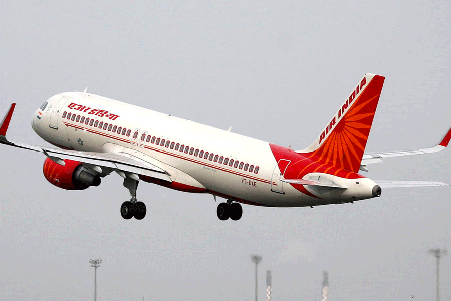 FILE PHOTO: An Air India Airbus A320 aircraft takes off from the Sardar Vallabhbhai Patel International Airport in Ahmedabad