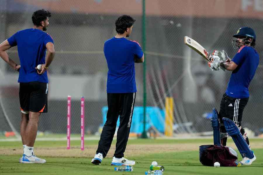 India’s Ishan Kishan, right, Abhishek Sharma, centre, during a practice session ahead of the ICC Men's T20 World Cup 2026 cricket match between India and Zimbabwe