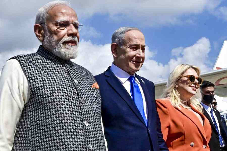 Narendra Modi with his Israeli counterpart Benjamin Netanyahu and his wife Sara Netanyahu upon arrival, near Tel Aviv, Israel