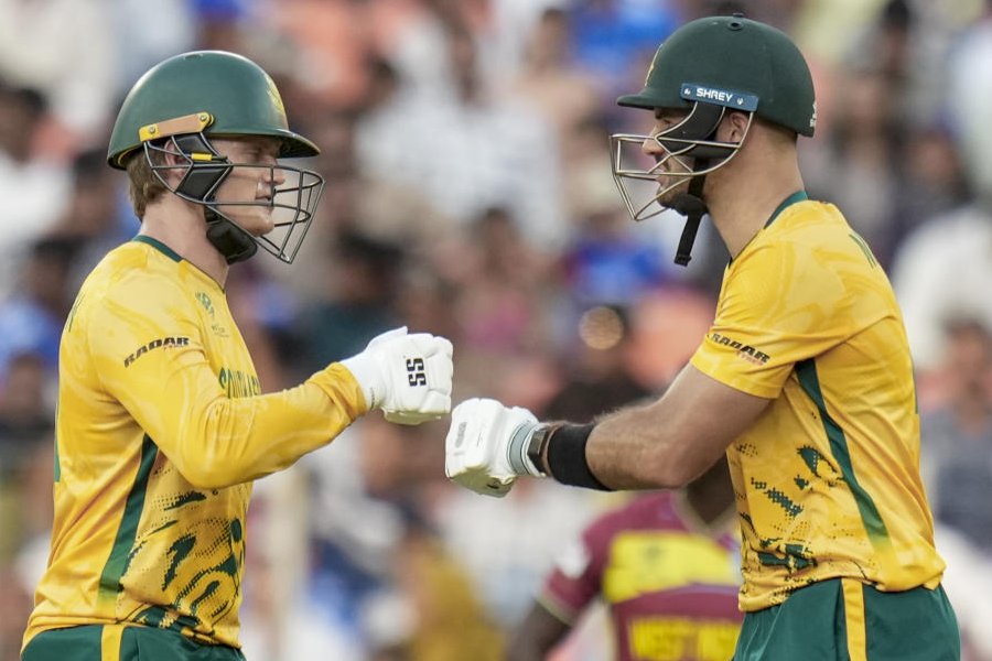 South Africa's captain Aiden Markram and teammate Ryan Rickelton during the ICC Men's T20 World Cup 2026 cricket match between West Indies and South Africa, at Narendra Modi Stadium, in Ahmedabad, Thursday, Feb. 26, 2026.