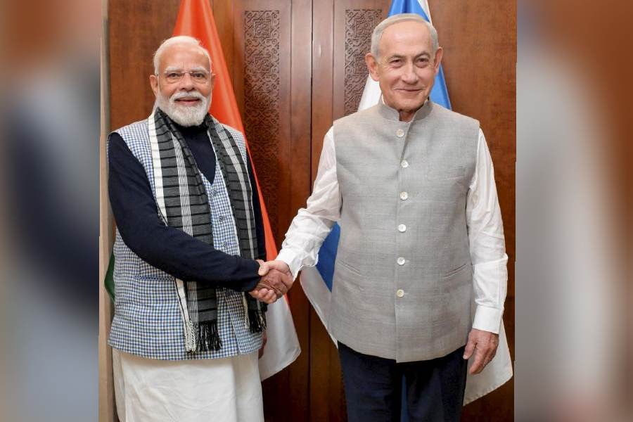 Screengrab from a video posted on Feb. 26, 2026, Israeli Prime Minister Benjamin Netanyahu greets Prime Minister Narendra Modi while wearing traditional Indian attire ahead of their joint dinner, in Israel.