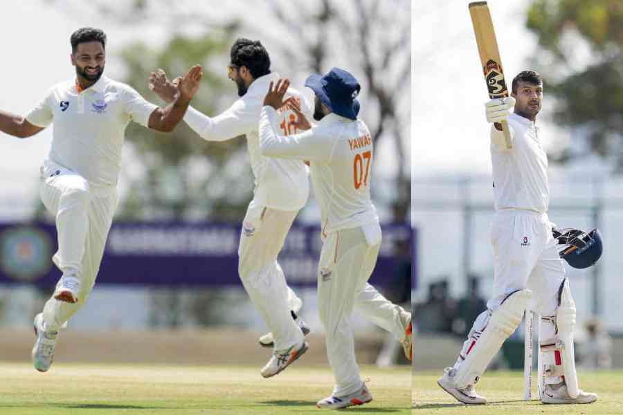 A delighted Auqib Nabi (left) celebrates with teammates after dismissing Smaran Ravichandran on Day III of the Ranji Trophy final against Karnataka. (Picture right) Mayank Agarwal of Karnataka after reaching his century on Thursday.